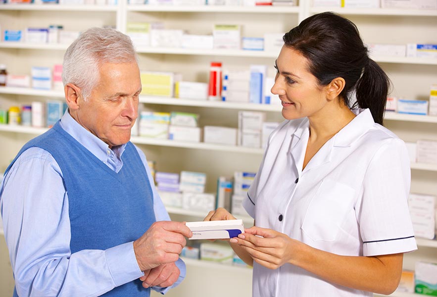 man looking at paper with nurse nearby Contractors Insurance in Medina