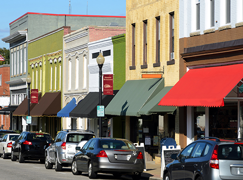 main street line with storefronts that have Business Insurance in Litchfield, OH, Strongsville, Hinckley, OH, and Nearby Cities