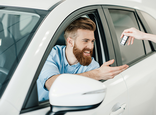 man smiling getting his keys because he has Auto Insurance in Medina, OH, Fairlawn, Valley City, OH, Middleburg Heights, North Royalton, , Strongsville and Nearby Cities