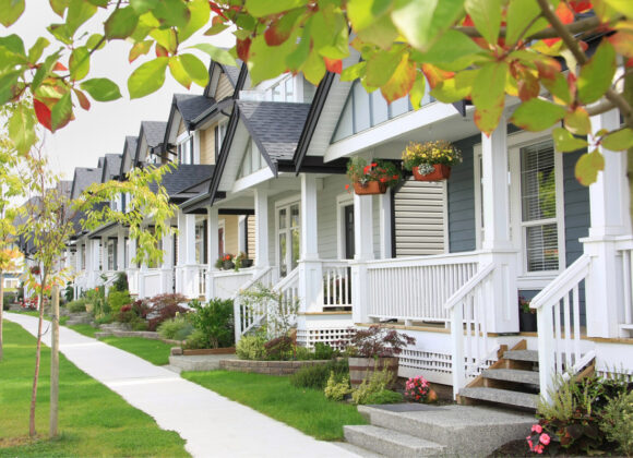 a row of homes with white fencing with Home Insurance Quotes in North Royalton, Middleburg Heights, Valley City, OH, Strongsville, Litchfield, OH, Fairlawn and Surrounding Areas